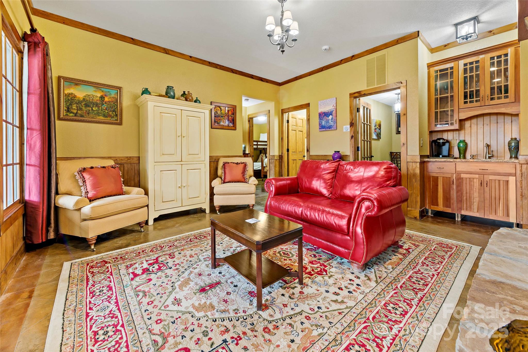 1237 South Cove Road Mill Spring, NC 28756 - Photo 22 of 44 a living room with furniture and a rug