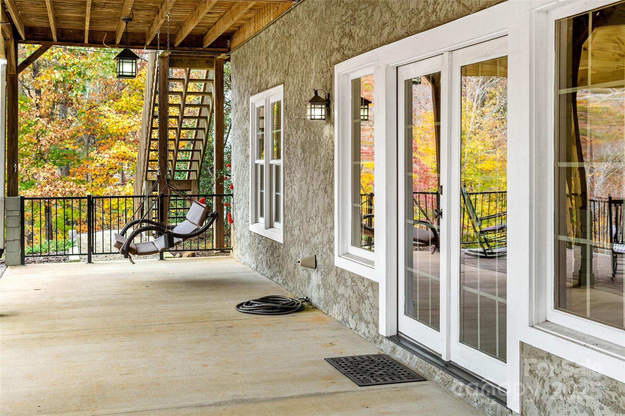 1237 South Cove Road Mill Spring, NC 28756 - Photo 32 of 44 a view of a balcony with couch
