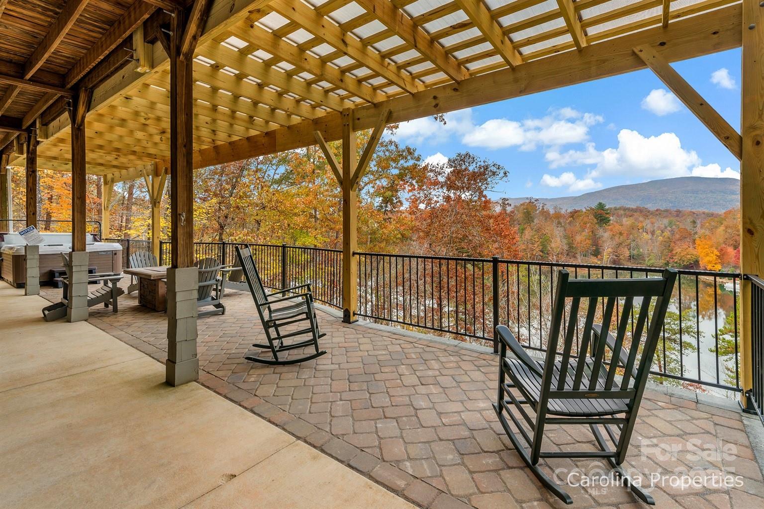 1237 South Cove Road Mill Spring, NC 28756 - Photo 36 of 44 a view of a chairs and table in the patio