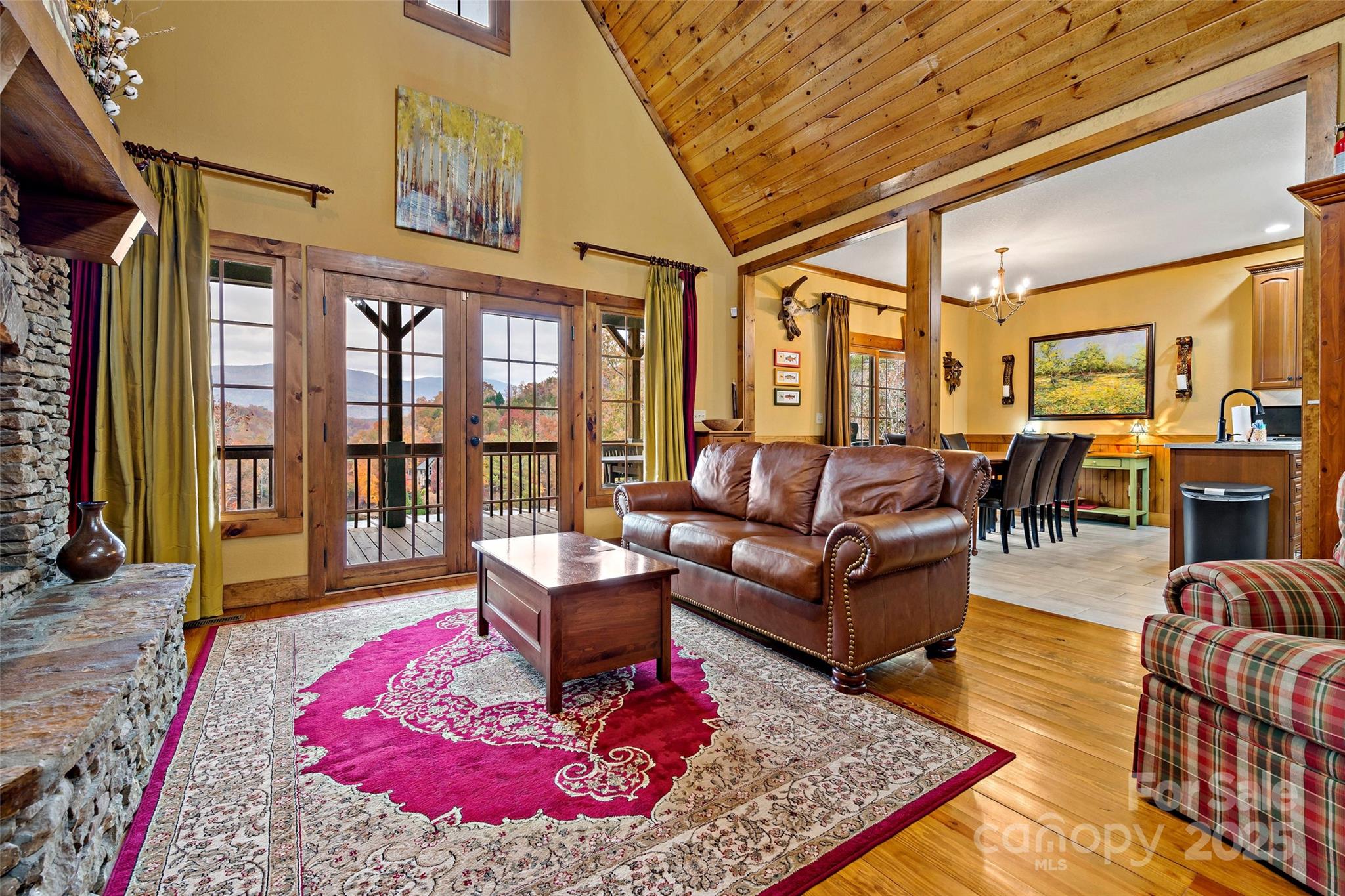 1237 South Cove Road Mill Spring, NC 28756 - Photo 5 of 44 a living room with furniture rug and large windows