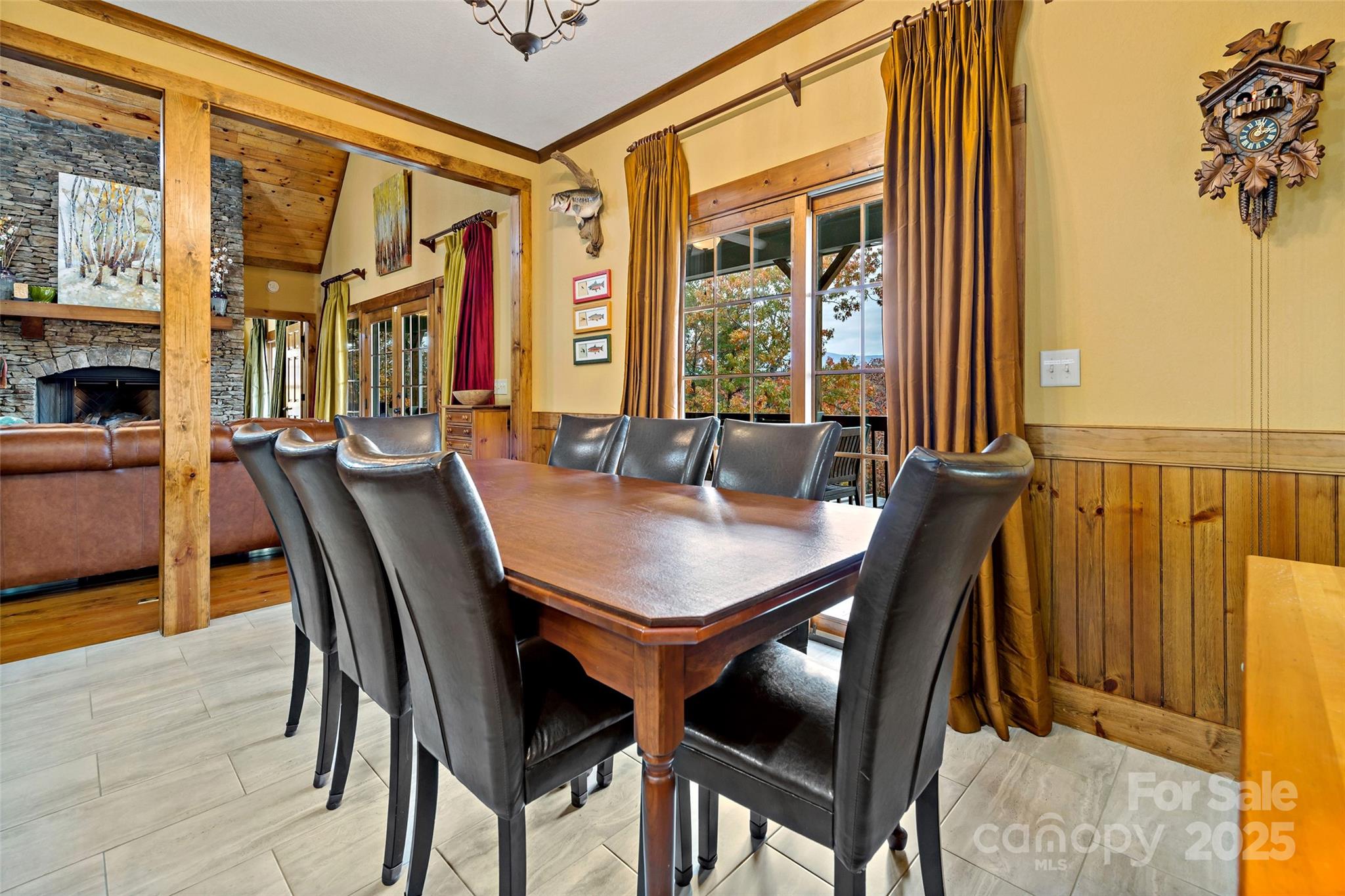 1237 South Cove Road Mill Spring, NC 28756 - Photo 7 of 44 a view of a dining room with furniture and window