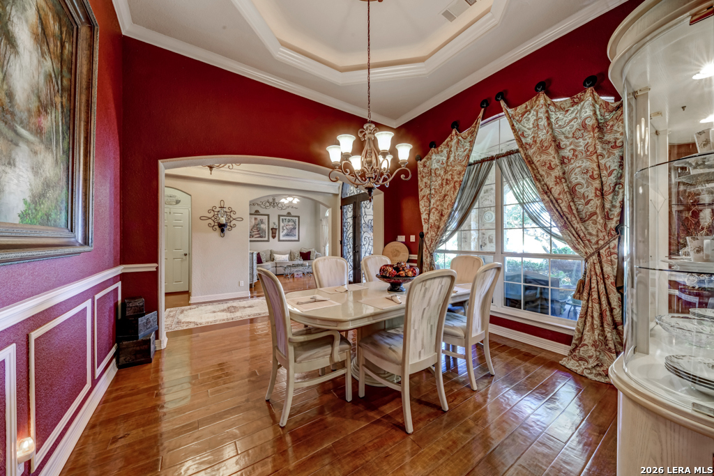 1700 Frontier Spring Branch, TX 78070 - Photo 18 of 74 a view of a dining room with furniture and wooden floor