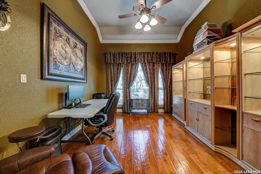 1700 Frontier Spring Branch, TX 78070 - Photo 21 of 74 a view of a dining room with furniture a chandelier and wooden floor