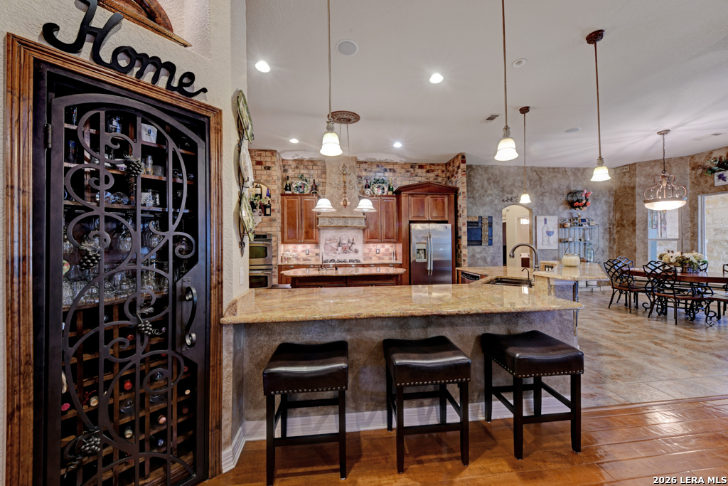 1700 Frontier Spring Branch, TX 78070 - Photo 24 of 74 a large kitchen with a table and chairs