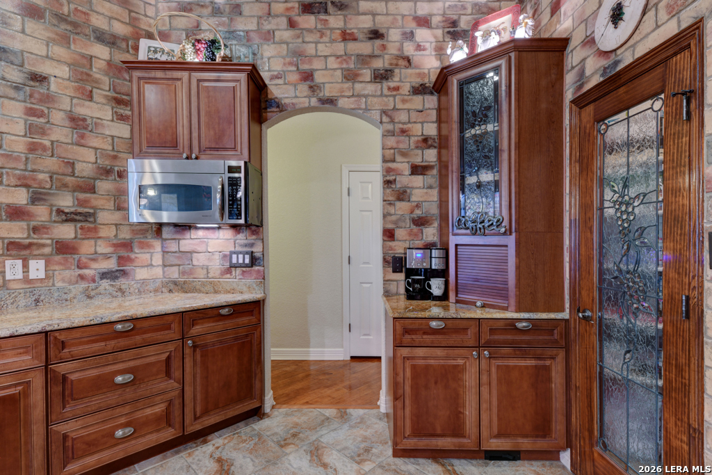 1700 Frontier Spring Branch, TX 78070 - Photo 28 of 74 a bathroom with a granite countertop sink and a mirror