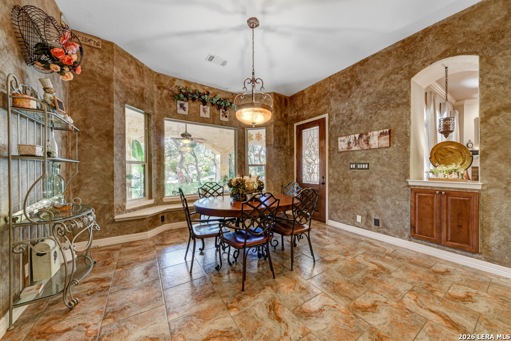 1700 Frontier Spring Branch, TX 78070 - Photo 31 of 74 a view of a dining room with furniture window and outside view