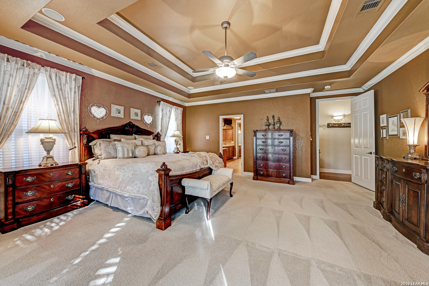 1700 Frontier Spring Branch, TX 78070 - Photo 39 of 74 a spacious bedroom with a bed and a chandelier