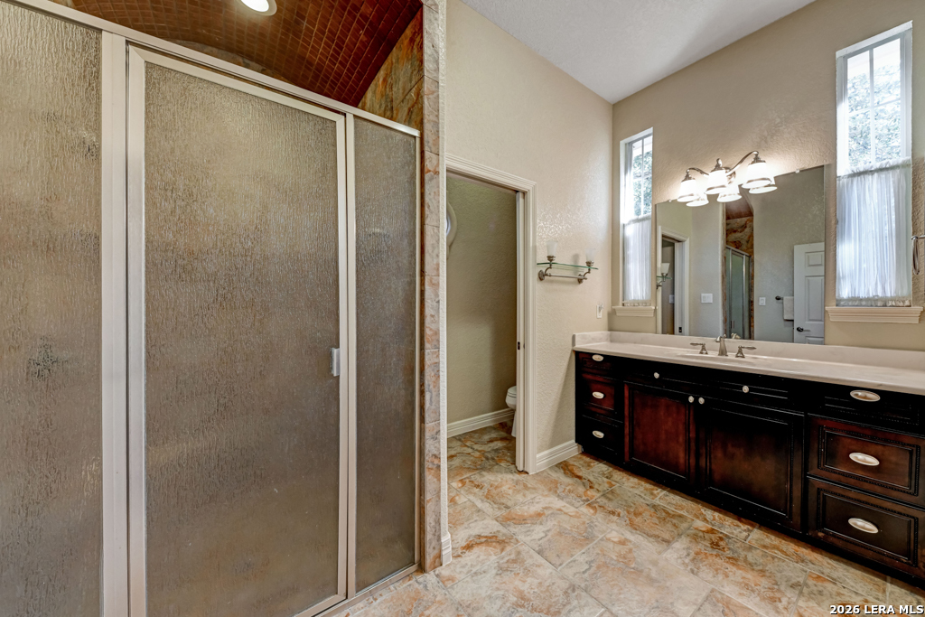 1700 Frontier Spring Branch, TX 78070 - Photo 47 of 74 a spacious bathroom with a sink and a mirror