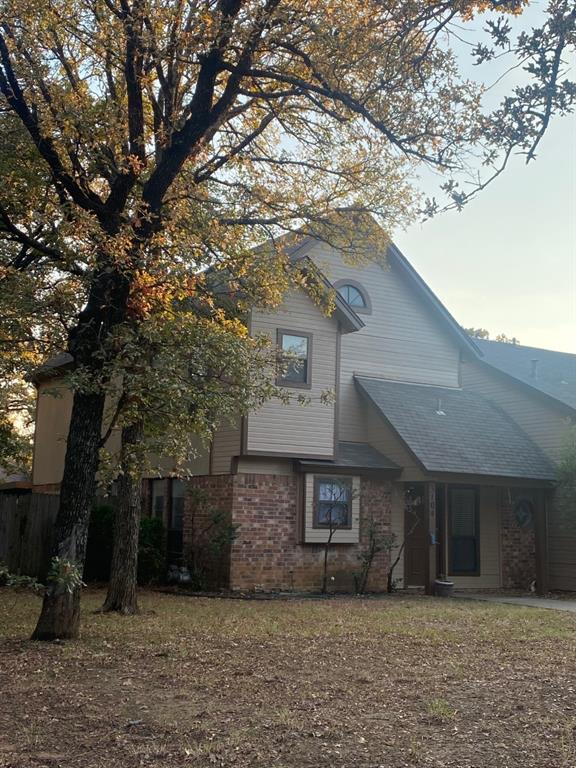 3104 Timber Ridge Grapevine, TX 76051 - Photo 12 of 12 a front view of a house with a tree