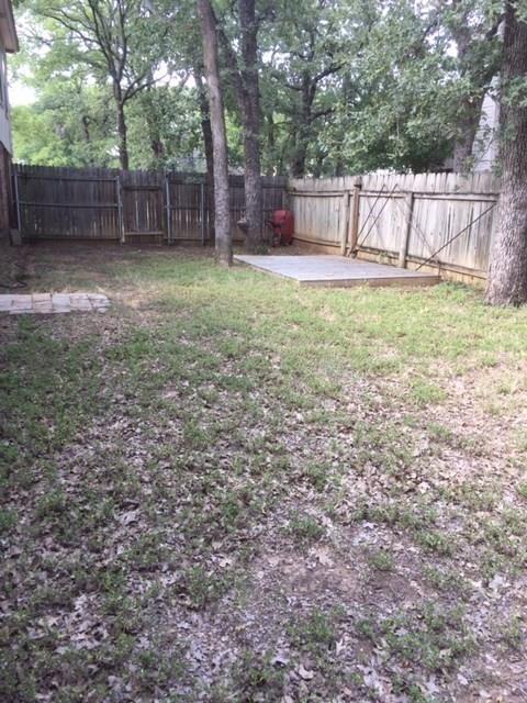 3104 Timber Ridge Grapevine, TX 76051 - Photo 10 of 12 a white house covered with tall trees