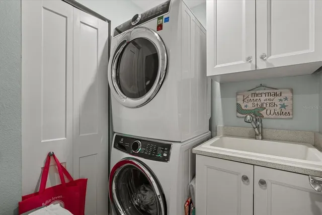 a kitchen with stainless steel appliances a stove and a refrigerator