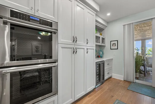 a view of a garage with rack and bicycle