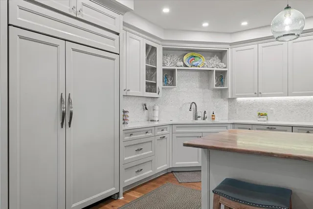 a view of a balcony with chairs