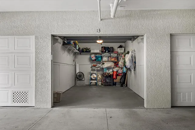 an aerial view of a house with garden space and plants