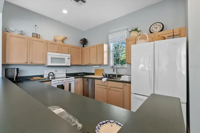 an aerial view of a city with lots of residential buildings