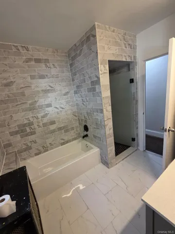 a bathroom with a bathtub