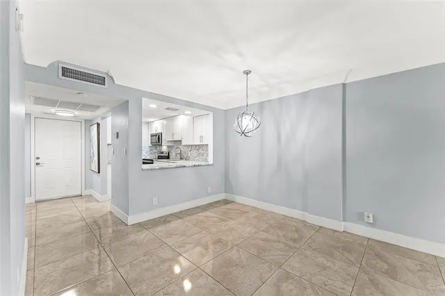 a view of an empty room with window