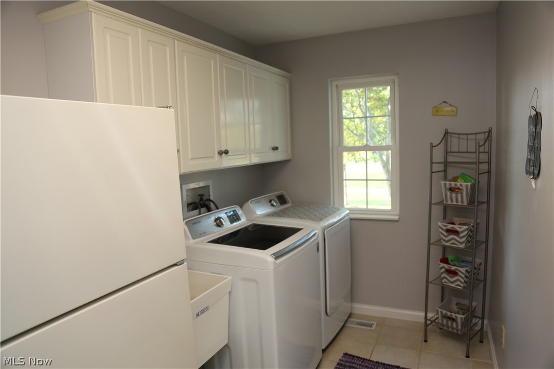 10834 Old Mill Road Spencer, OH 44275 - Photo 15 of 34 Laundry room with utility sink