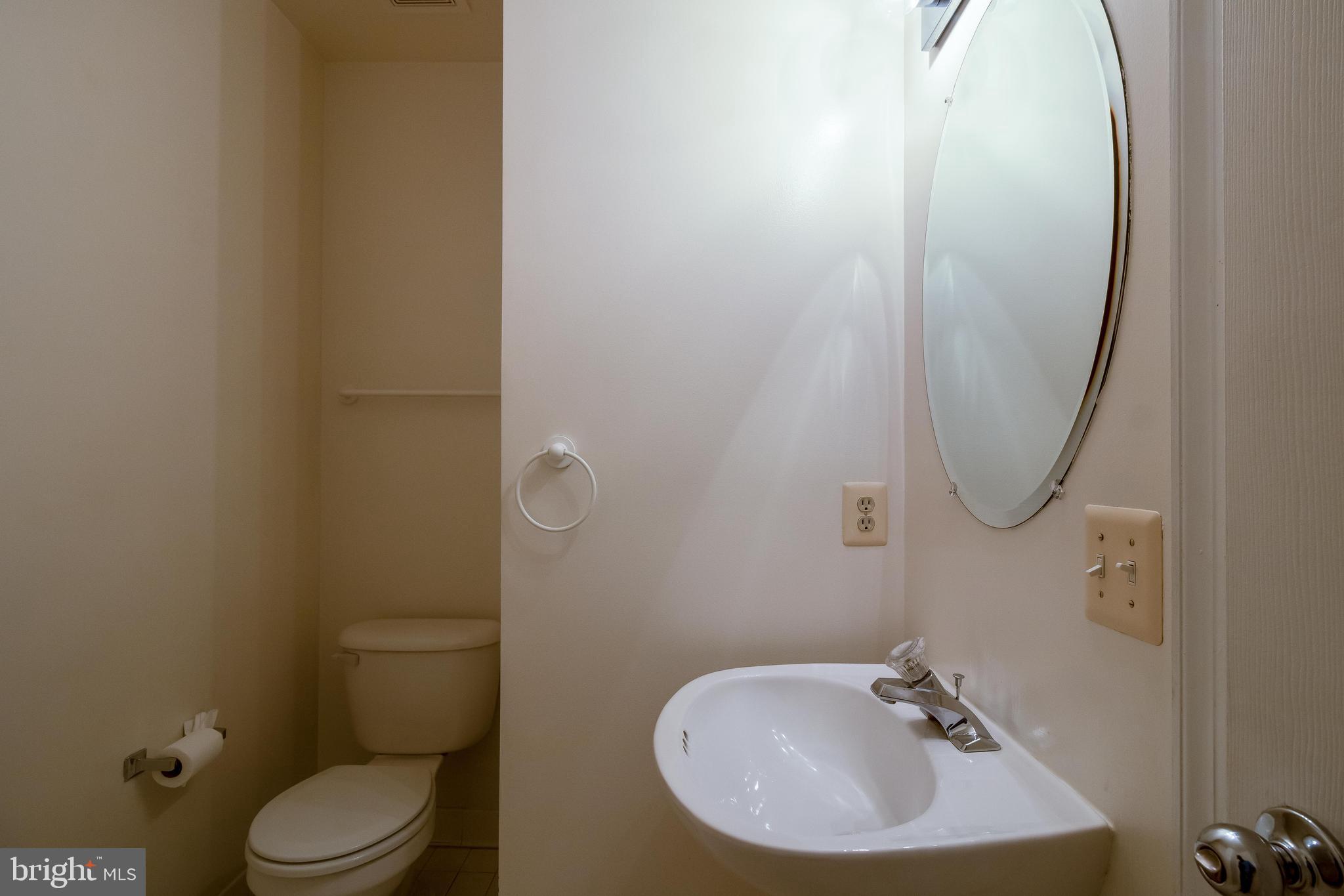 8441 Tackhouse Loop Gainesville, VA 20155 - Photo 8 of 47 Half bathroom - main level