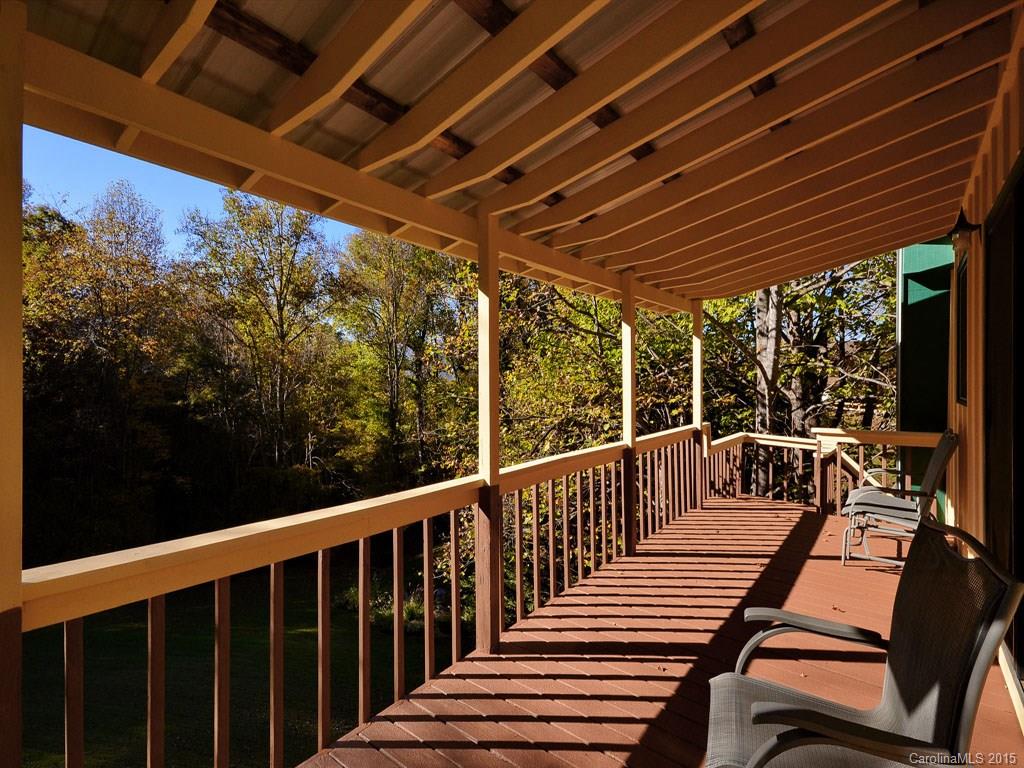 630 Parrish Farm Road Waynesville, NC 28786 - Photo 22 of 24 a view of a chairs and table in the patio