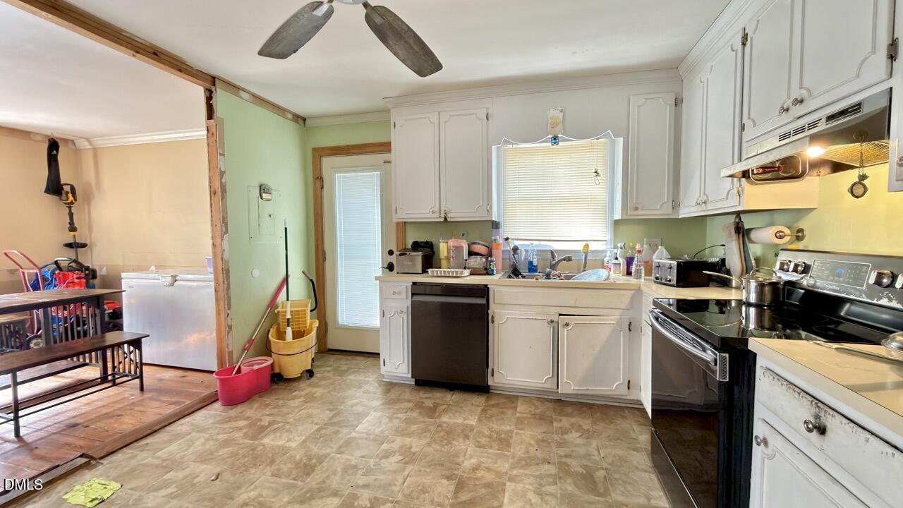 2707 Ridge Road Northwest Wilson, NC 27896 - Photo 11 of 33 a kitchen with sink cabinets and appliances