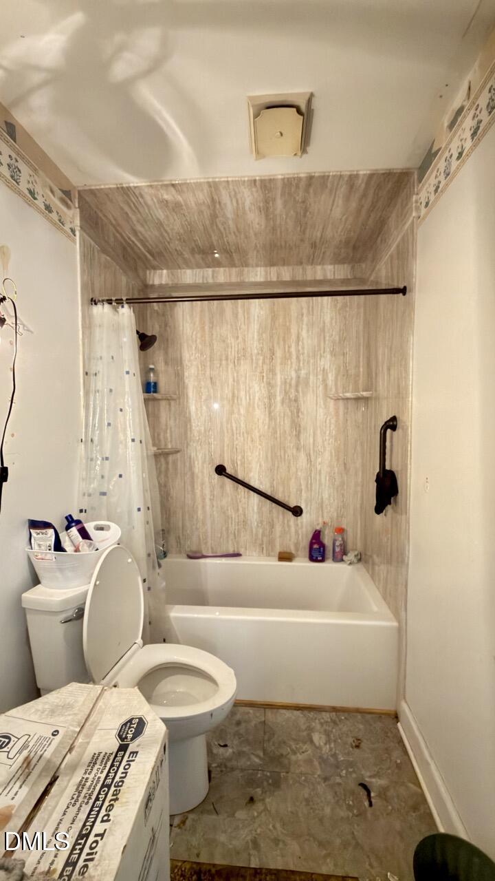 2707 Ridge Road Northwest Wilson, NC 27896 - Photo 14 of 33 a bathroom with a sink toilet and shower