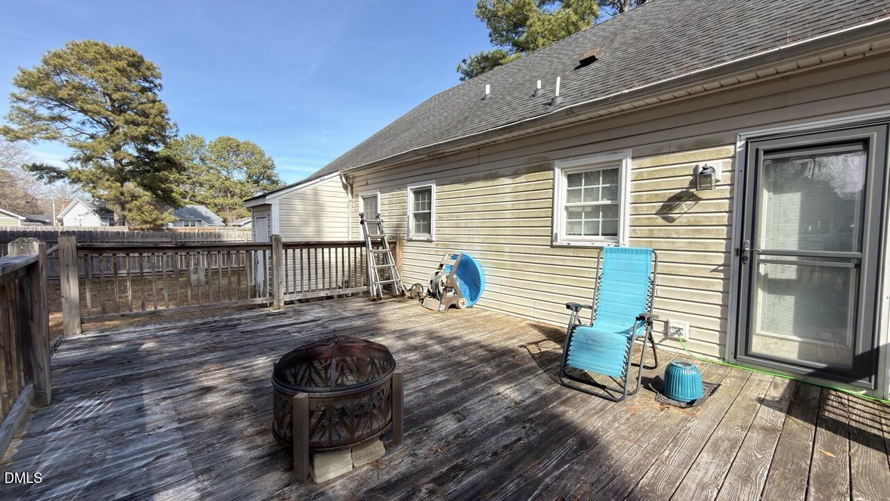 2707 Ridge Road Northwest Wilson, NC 27896 - Photo 31 of 33 a view of a chairs and table on the wooden floor