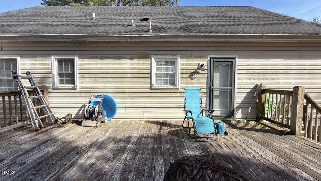 2707 Ridge Road Northwest Wilson, NC 27896 - Photo 32 of 33 a view of deck with chair and table
