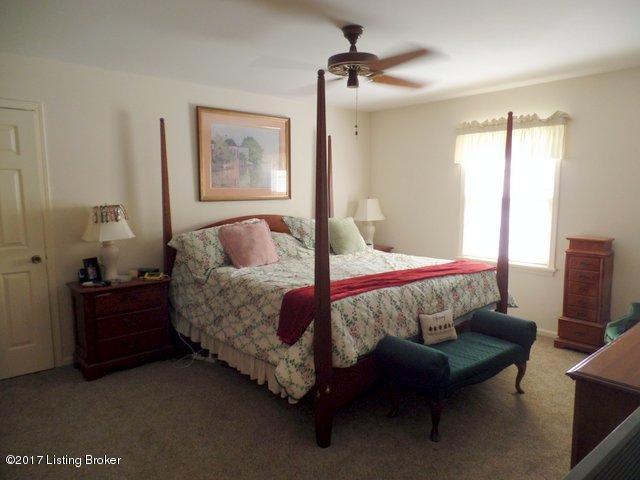 707 Farmingham Road Louisville, KY 40243 - Photo 15 of 23 Master bedroom with new carpet and a large to die for walk-in closet