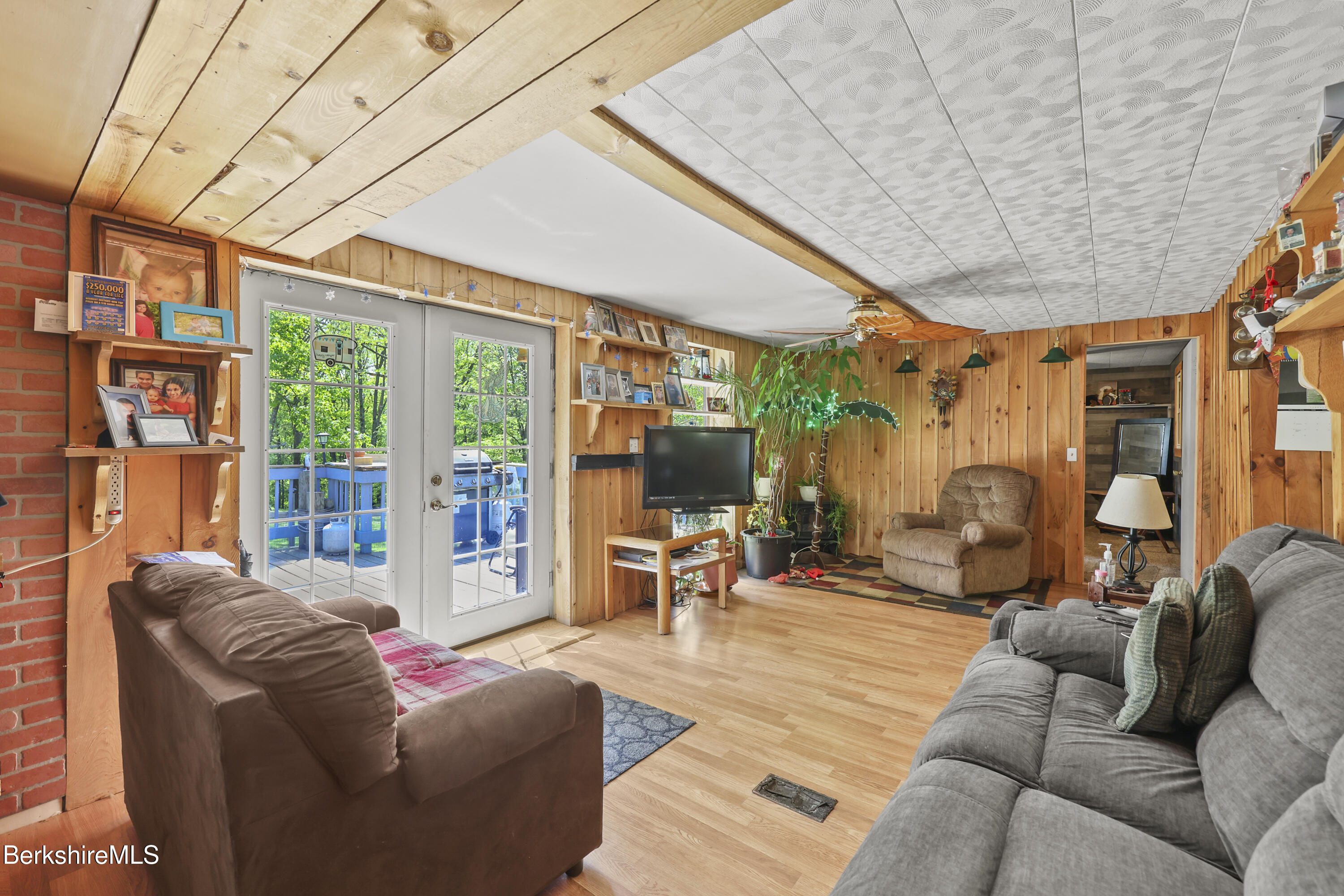 192 Curran Road Cheshire, MA 01225 - Photo 14 of 50 a living room with furniture and large windows