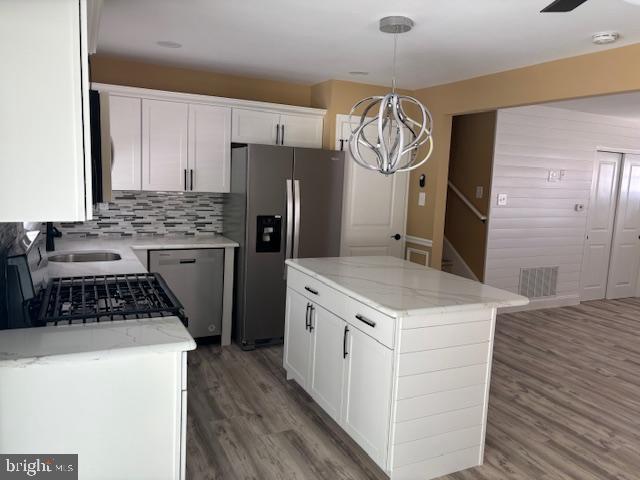 106 Bethel Road Somers Point, NJ 08244 - Photo 14 of 37 a kitchen with a stove a refrigerator and a sink