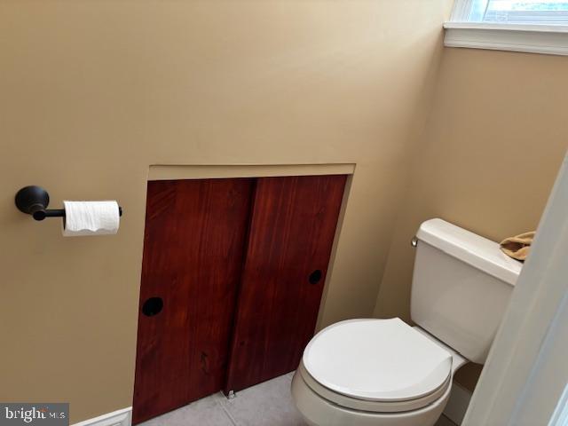 106 Bethel Road Somers Point, NJ 08244 - Photo 31 of 37 a white toilet sitting next to a wooden cabinet