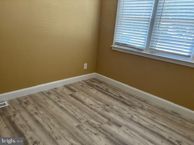 106 Bethel Road Somers Point, NJ 08244 - Photo 34 of 37 a view of a room with wooden floor and a window