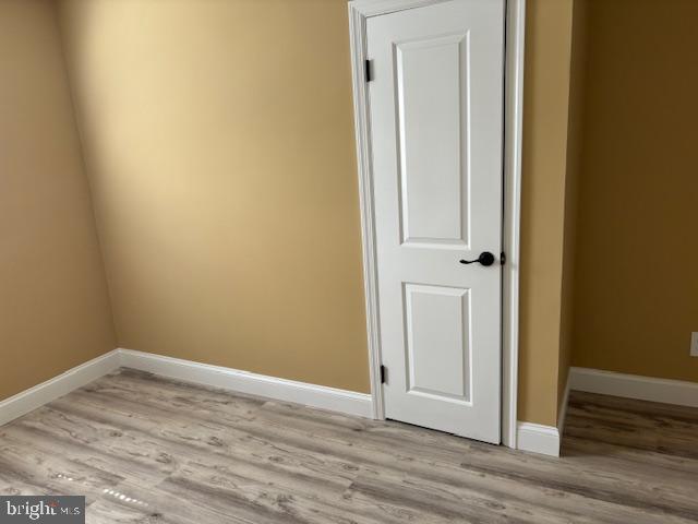 106 Bethel Road Somers Point, NJ 08244 - Photo 35 of 37 an empty room with wooden floor and closet