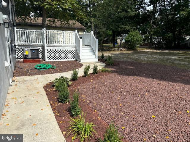106 Bethel Road Somers Point, NJ 08244 - Photo 6 of 37 a view of a yard with wooden fence