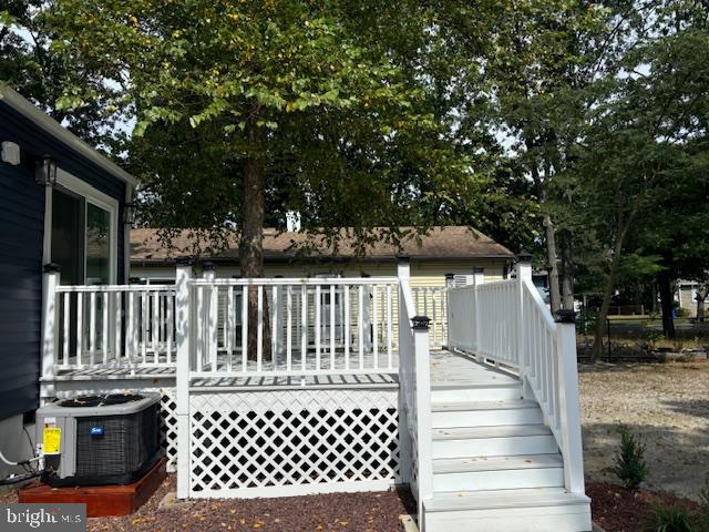 106 Bethel Road Somers Point, NJ 08244 - Photo 7 of 37 a view of a brick house with wooden fence