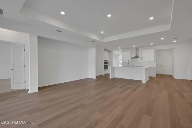 an empty room with windows