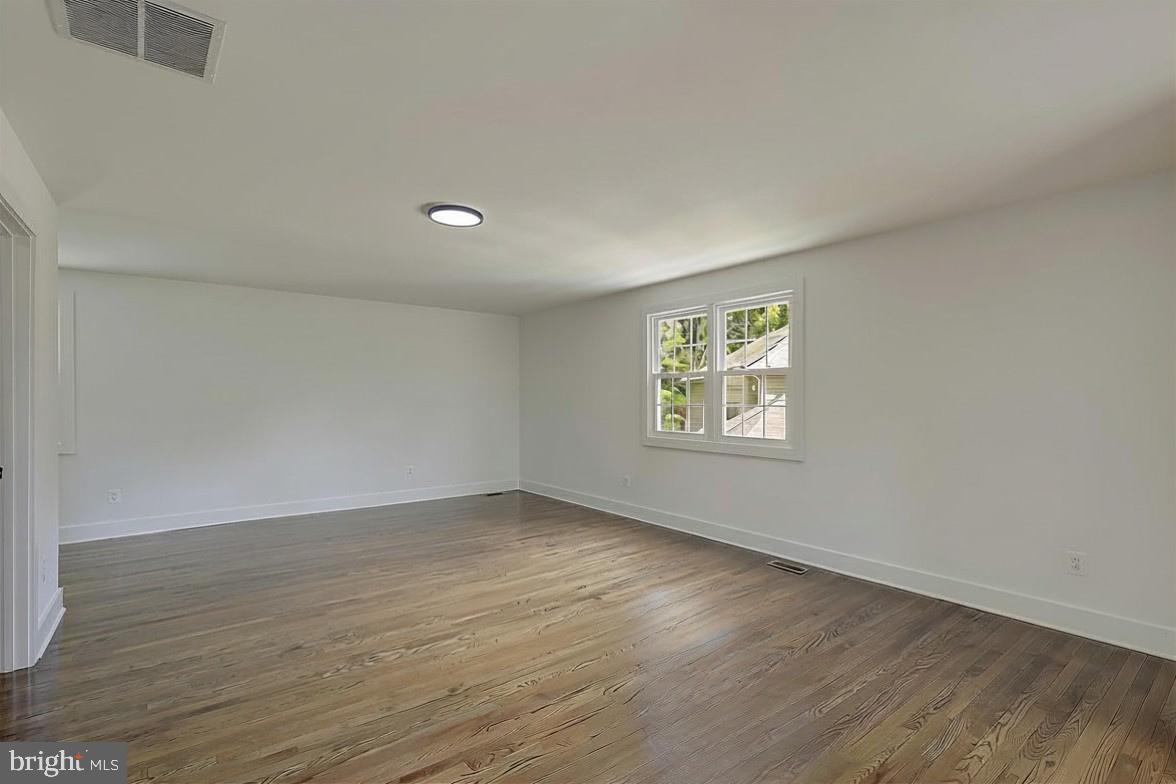 1107 Swan Creek Road Fort Washington, MD 20744 - Photo 45 of 72 Spacious, sunlit Primary Bedroom with hardwood.