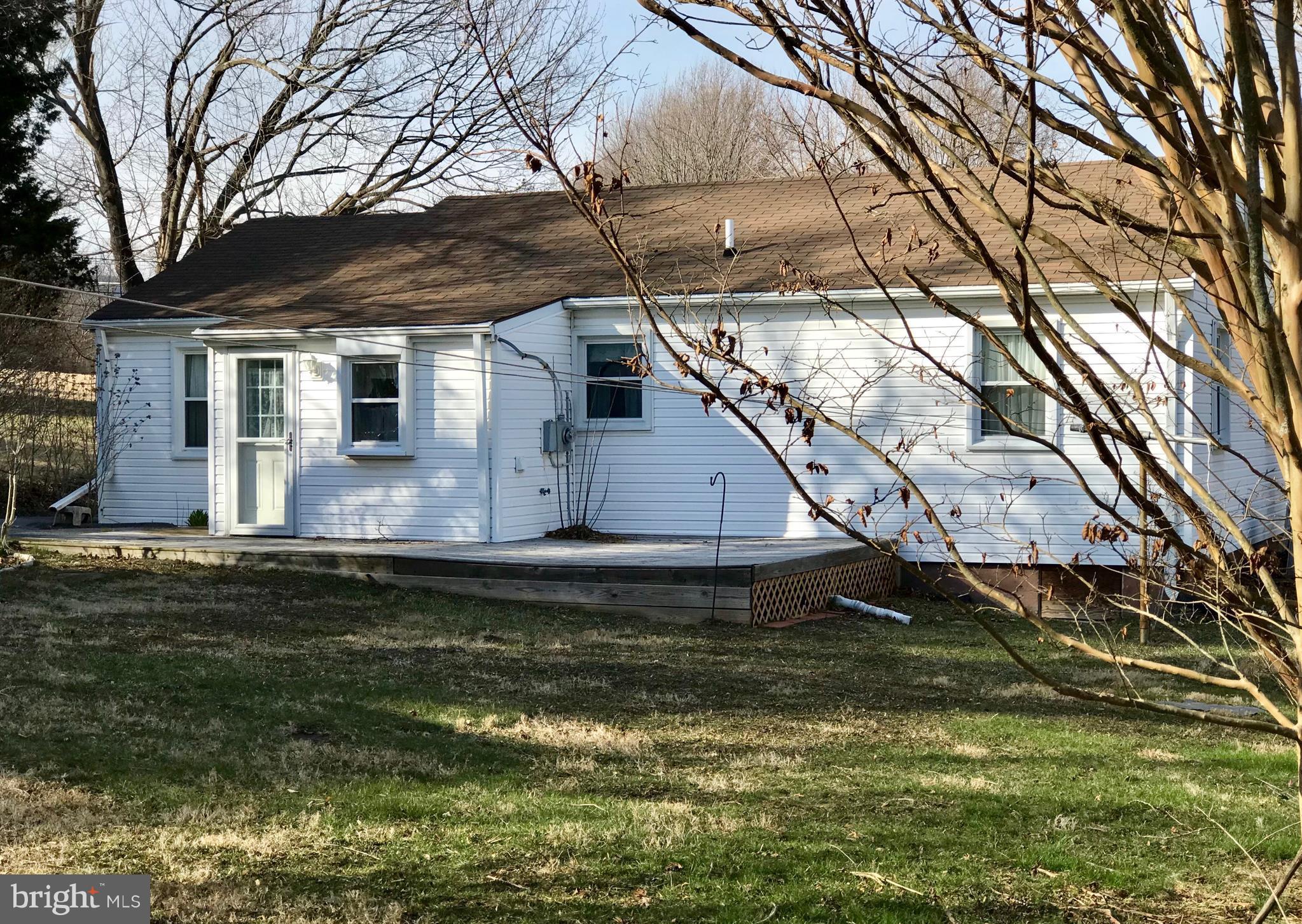 8531 Rocky Springs Road Frederick, MD 21702 - Photo 13 of 18 a view of a house with a yard