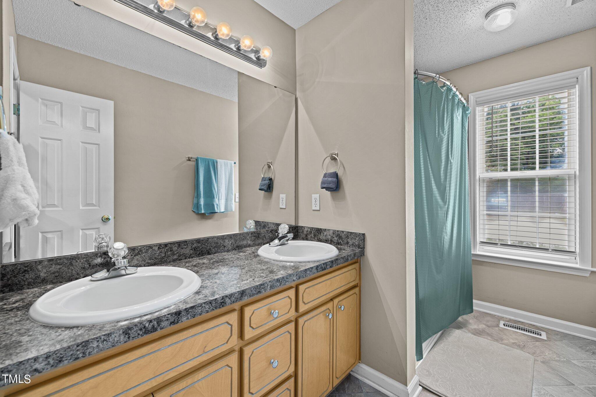 1320 Greenbranch Lane Raleigh, NC 27603 - Photo 18 of 29 2nd bathroom