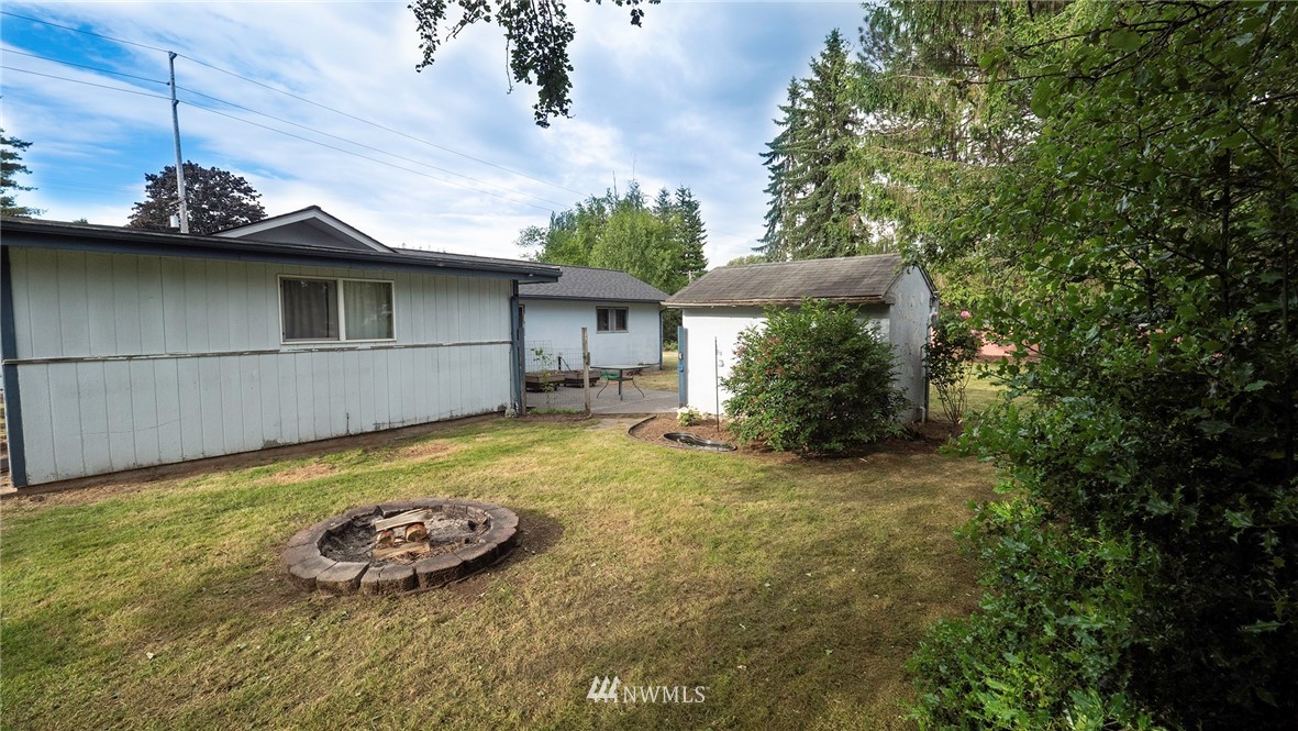 1849 Trigg Road Ferndale, WA 98248 - Photo 25 of 38 a view of a house with a yard and sitting area