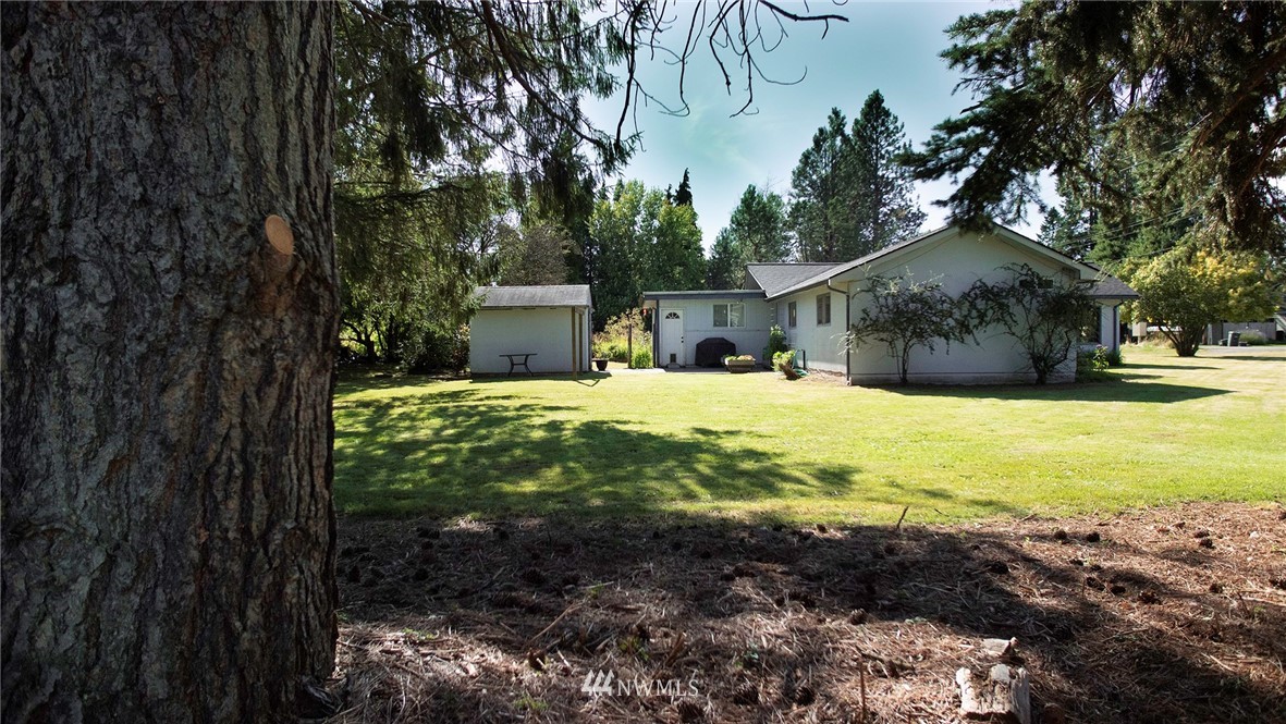 1849 Trigg Road Ferndale, WA 98248 - Photo 26 of 38 a view of a house with a yard