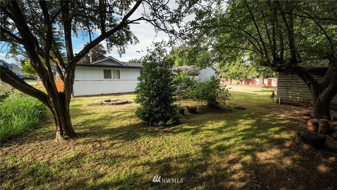 1849 Trigg Road Ferndale, WA 98248 - Photo 32 of 38 a view of a house with a tree in the yard
