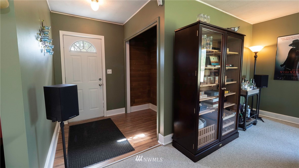 1849 Trigg Road Ferndale, WA 98248 - Photo 5 of 38 a room with mirror and furniture