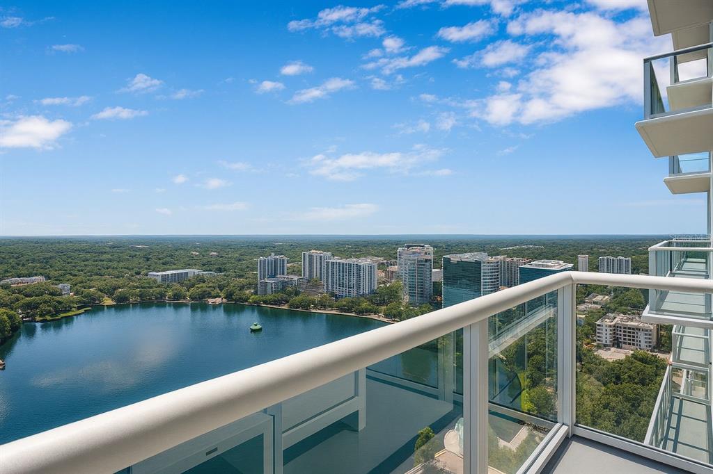 150 East Robinson Street, Unit 29B Orlando, FL 32801 - Photo 11 of 27 a view of a city skyline from a balcony