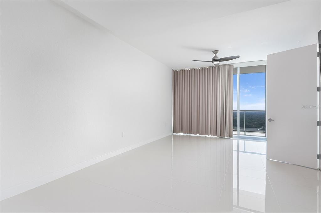 150 East Robinson Street, Unit 29B Orlando, FL 32801 - Photo 15 of 27 an empty room with windows