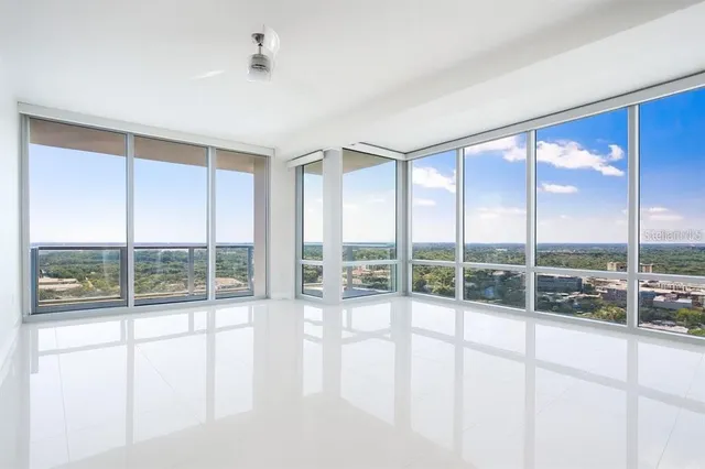 a view of an empty room and window