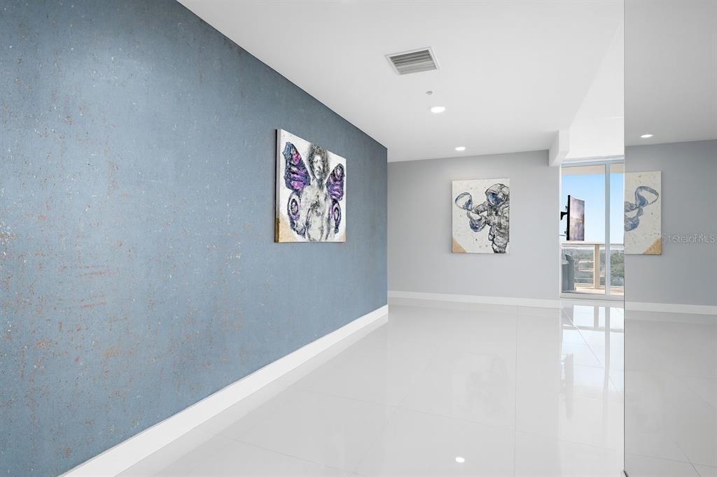 150 East Robinson Street, Unit 29B Orlando, FL 32801 - Photo 9 of 27 a view of a hallway with workspace