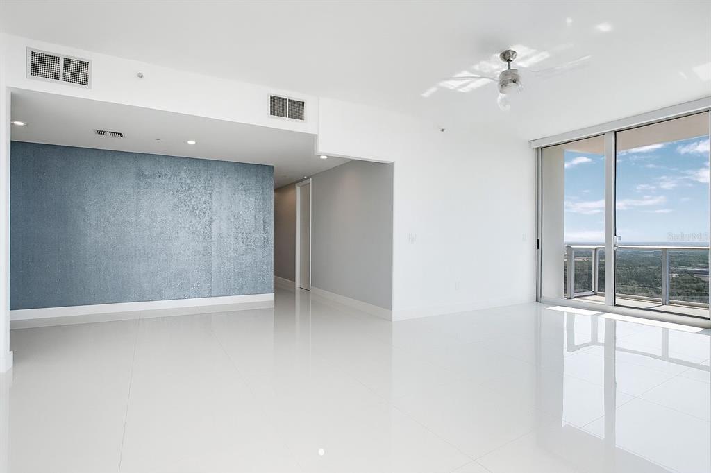 150 East Robinson Street, Unit 29B Orlando, FL 32801 - Photo 10 of 27 a view of an empty room with a window