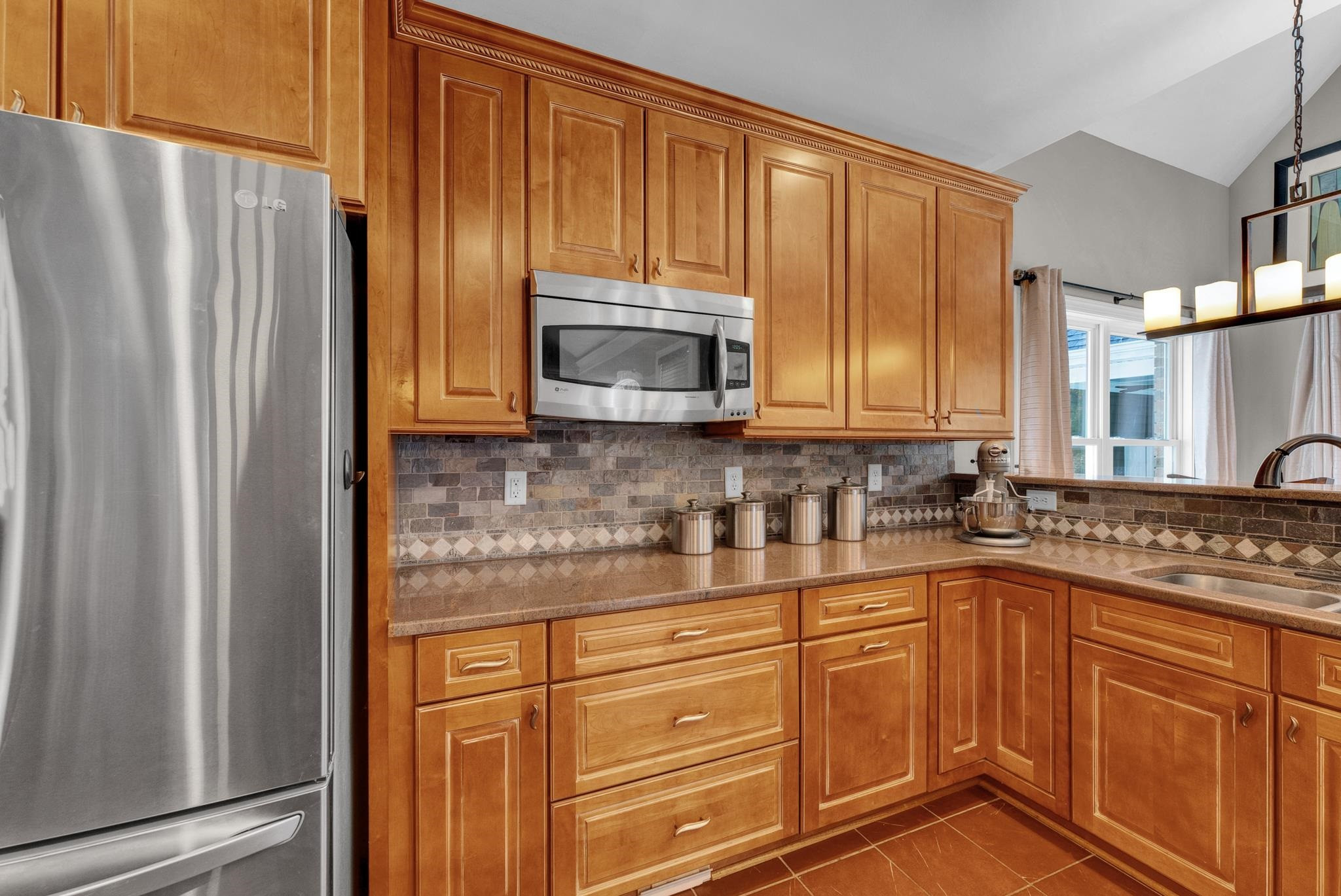 118 Citation Circle Durham, NC 27704 - Photo 11 of 67 a kitchen with stainless steel appliances granite countertop a refrigerator sink and cabinets